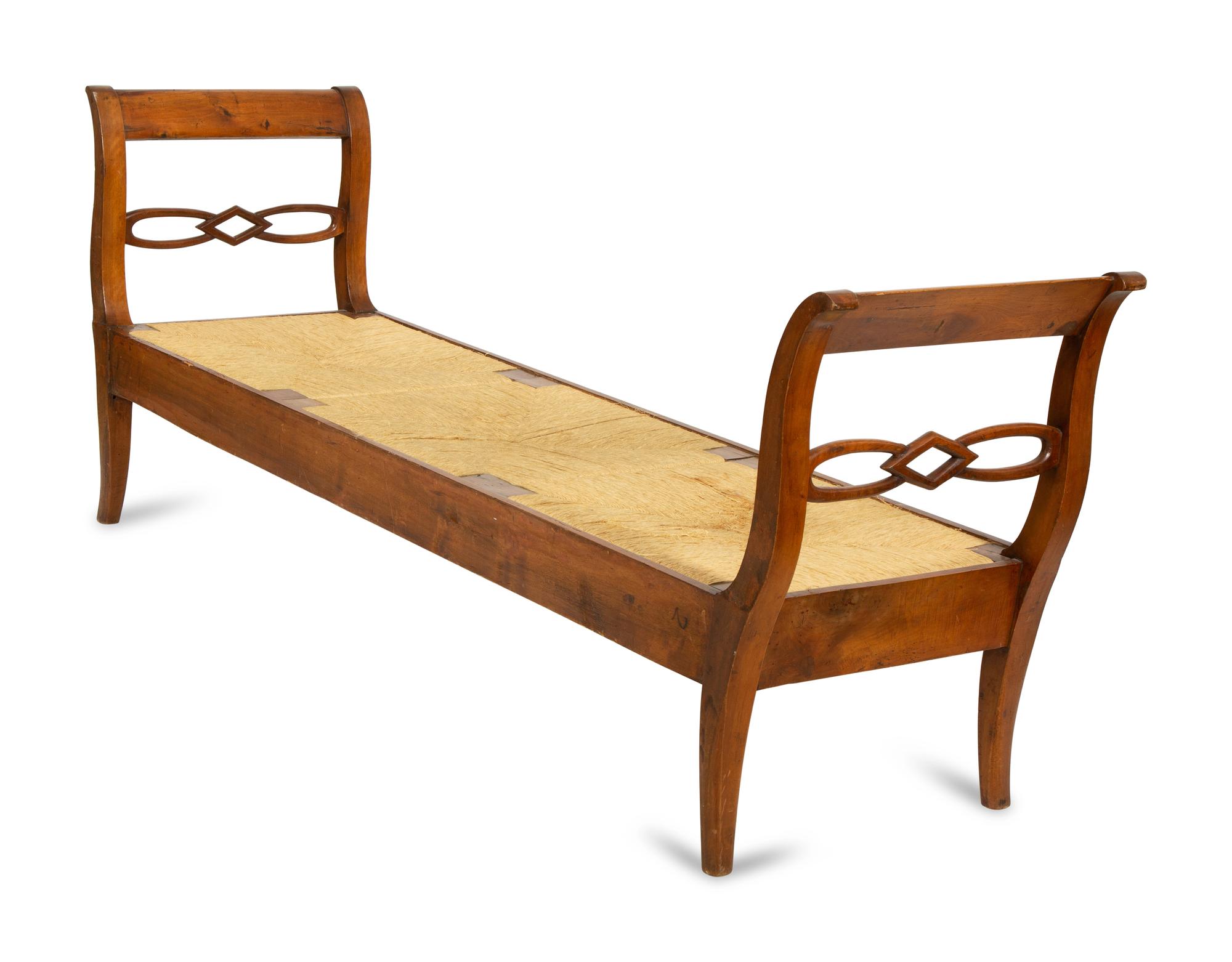 A Northern European Carved Walnut Bench with Rush Seat