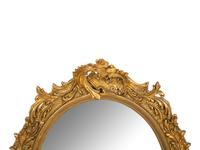 A Rococo-Style Carved Giltwood Girandole Mirror