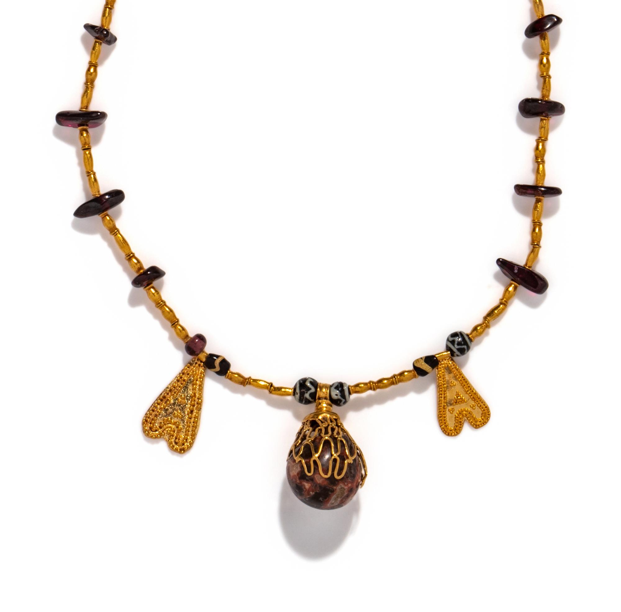 An Ancient Mediterranean Gold and Garnet Necklace