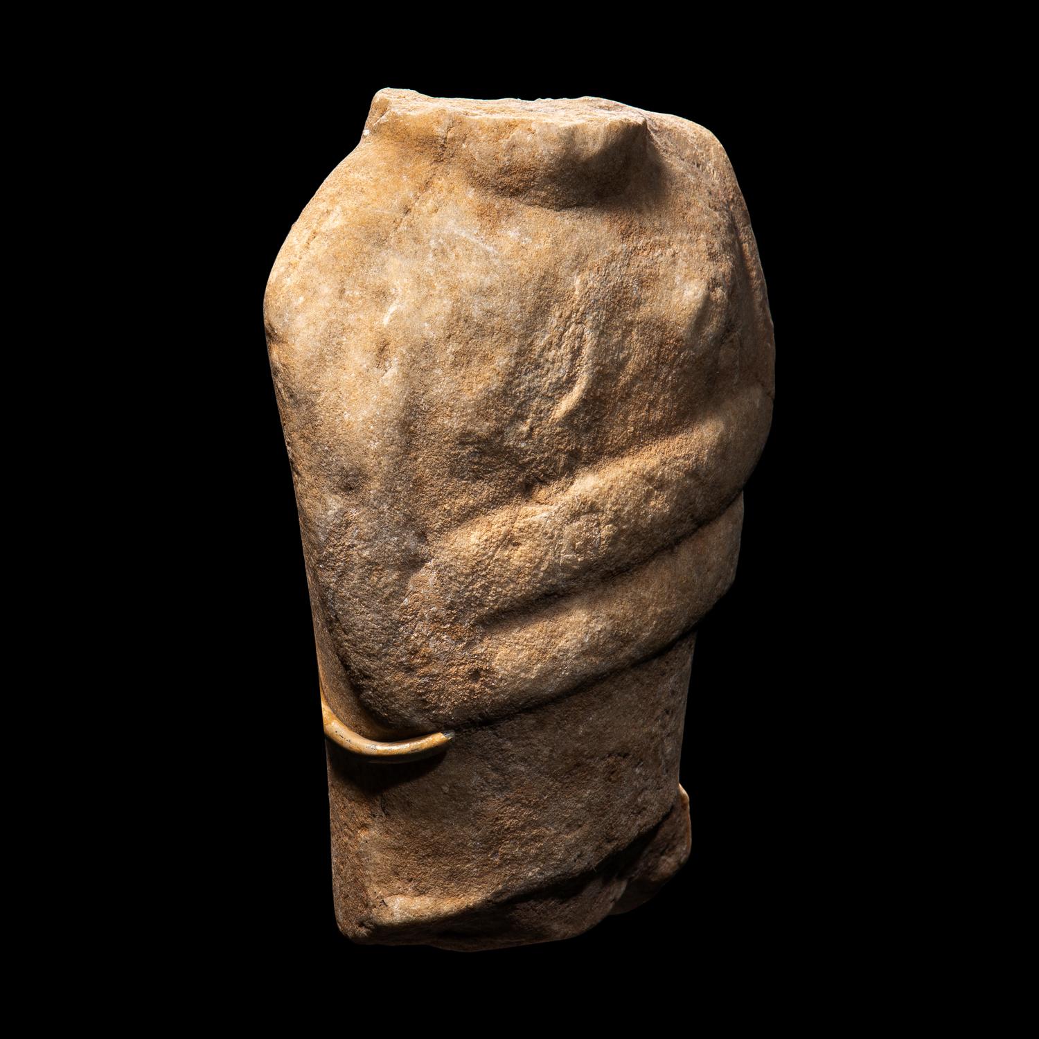 A Cycladic Marble Torso