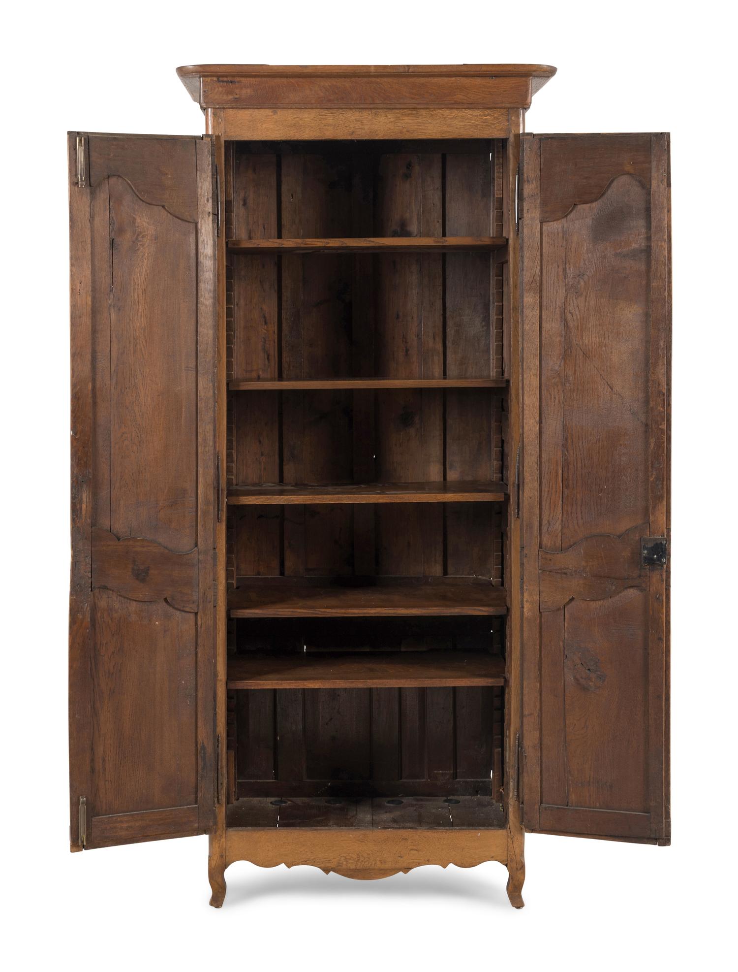 A French Provincial Walnut Armoire