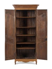 A French Provincial Walnut Armoire