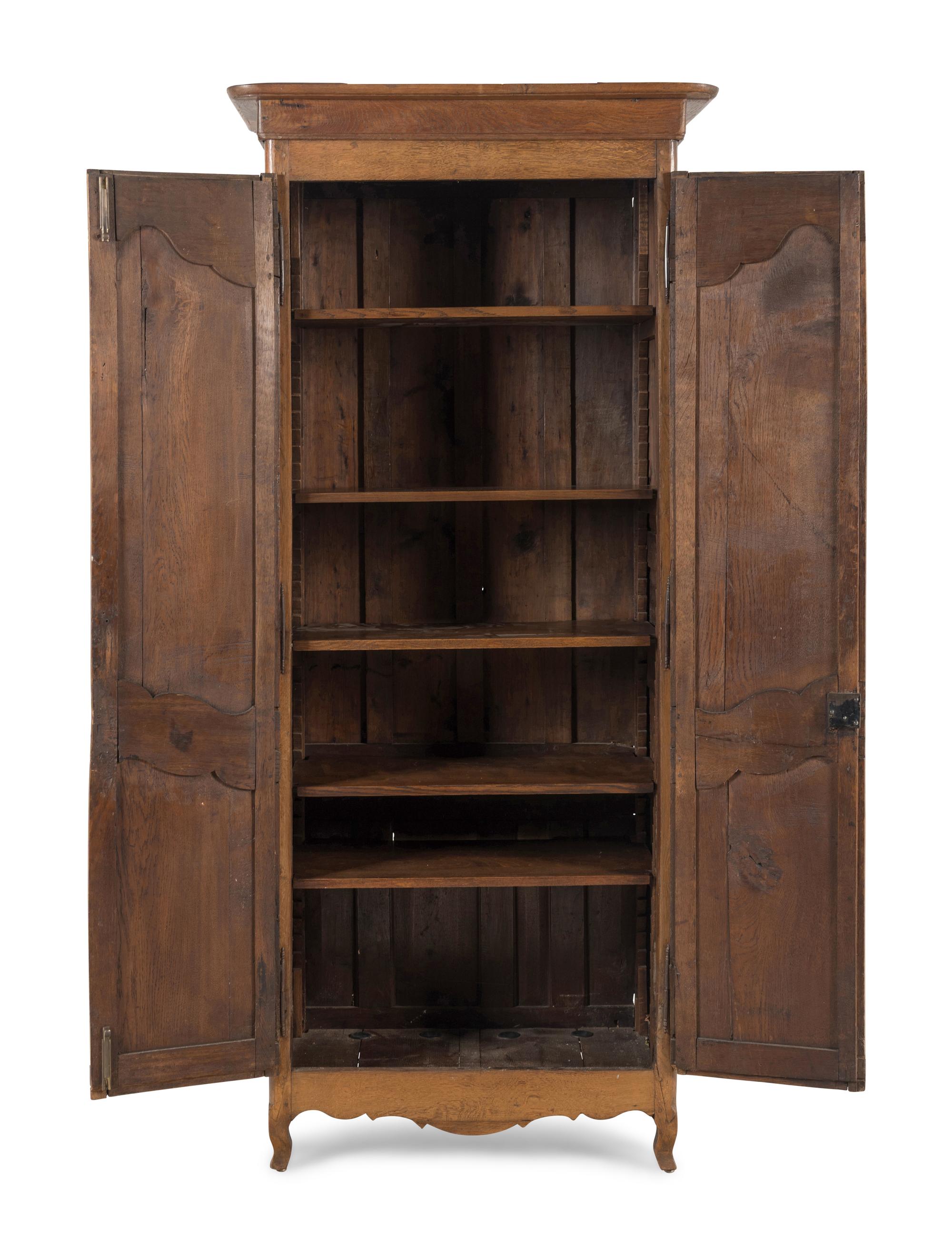 A French Provincial Walnut Armoire