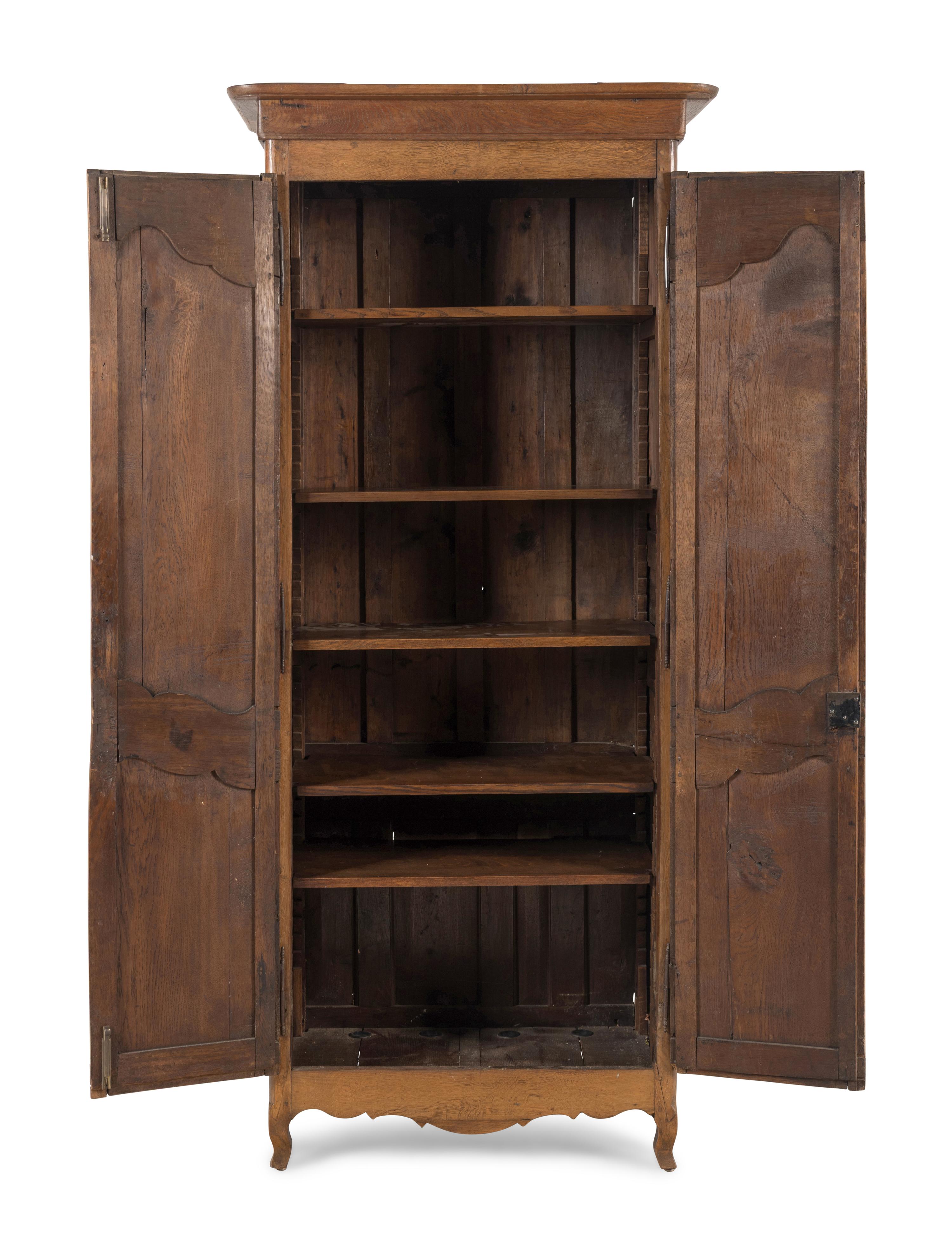A French Provincial Walnut Armoire