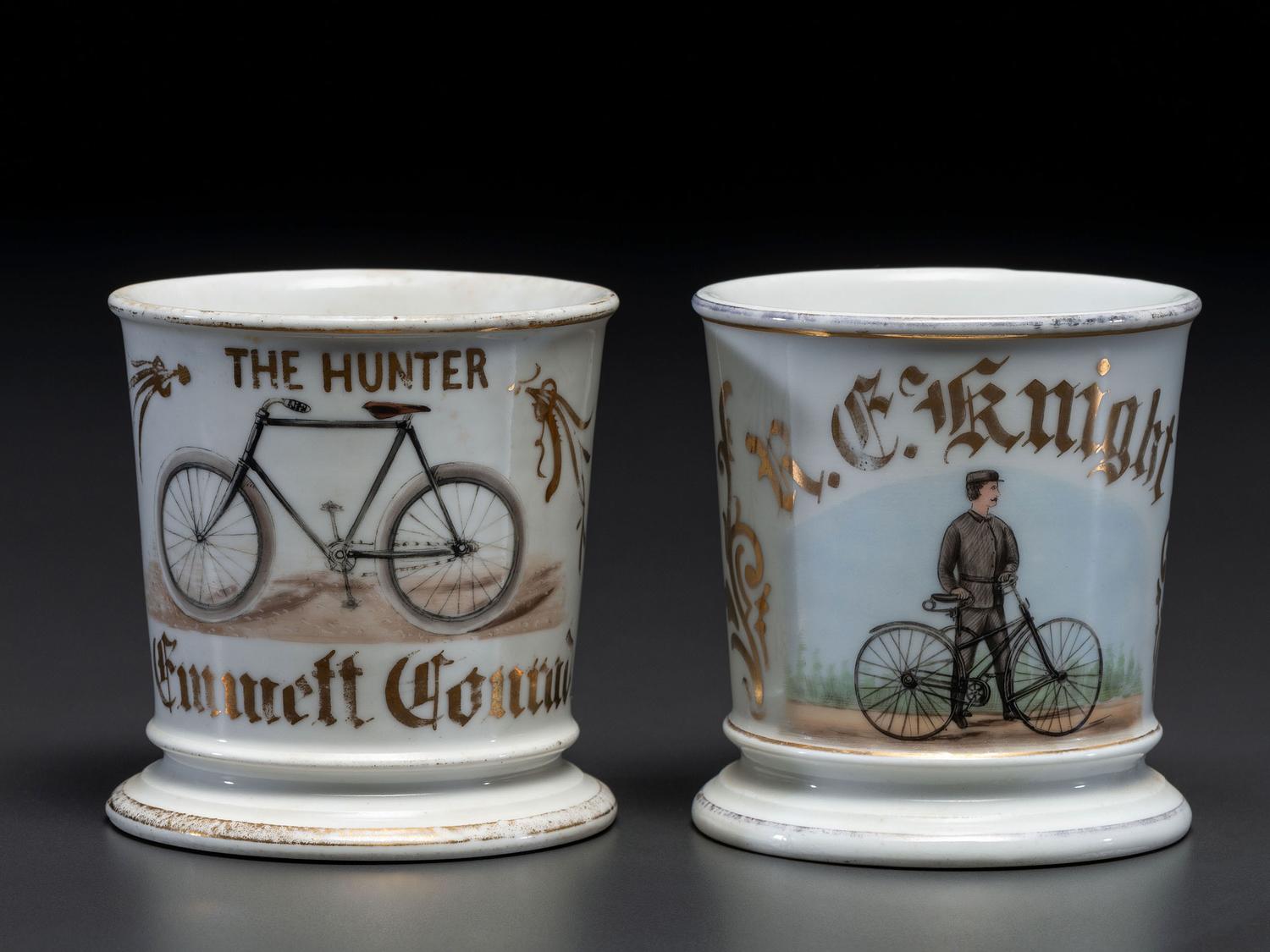 Two Cyclist's Porcelain Shaving Mugs