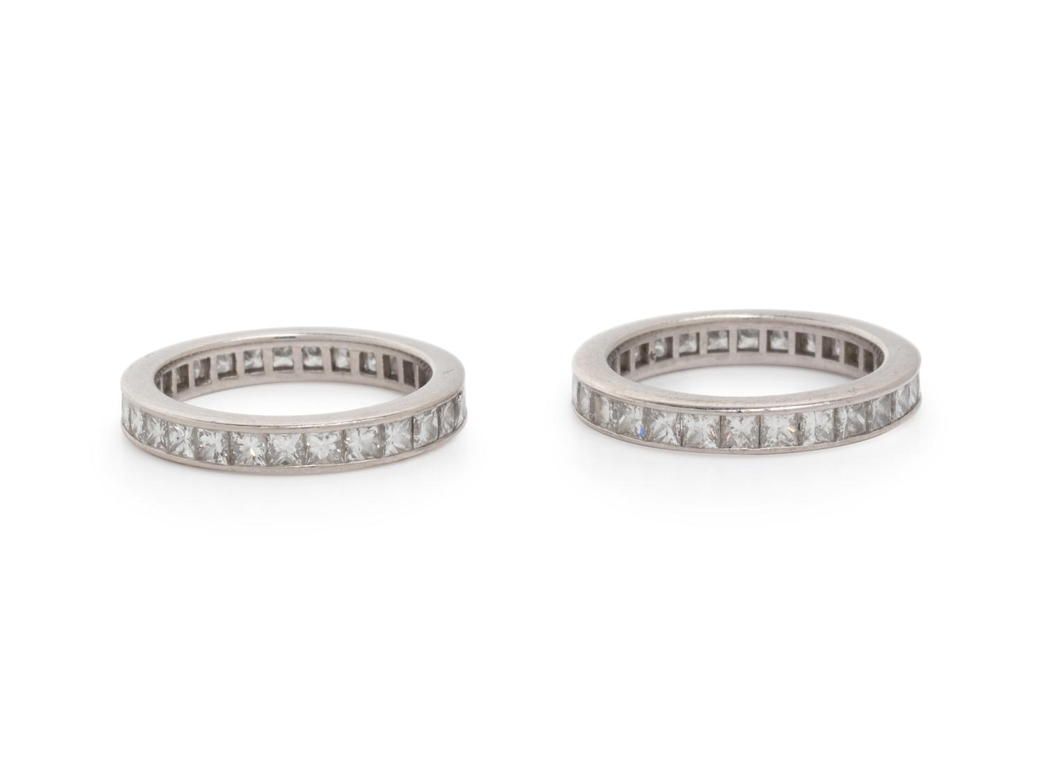 TIFFANY & CO., PAIR OF DIAMOND AND PLATINUM ETERNITY BANDS