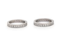 TIFFANY & CO., PAIR OF DIAMOND AND PLATINUM ETERNITY BANDS