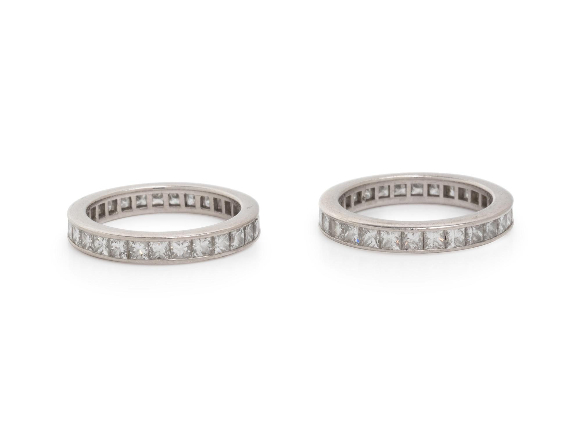 TIFFANY & CO., PAIR OF DIAMOND AND PLATINUM ETERNITY BANDS