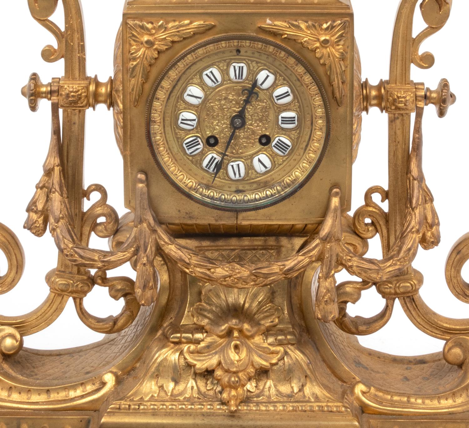 A Louis XVI Style Gilt Bronze Mantel Clock