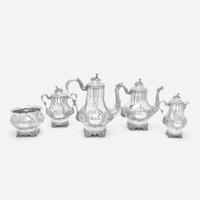 A five-piece coin silver repoussé tea and coffee service Wood & Hughes, New York, NY, circa 1850