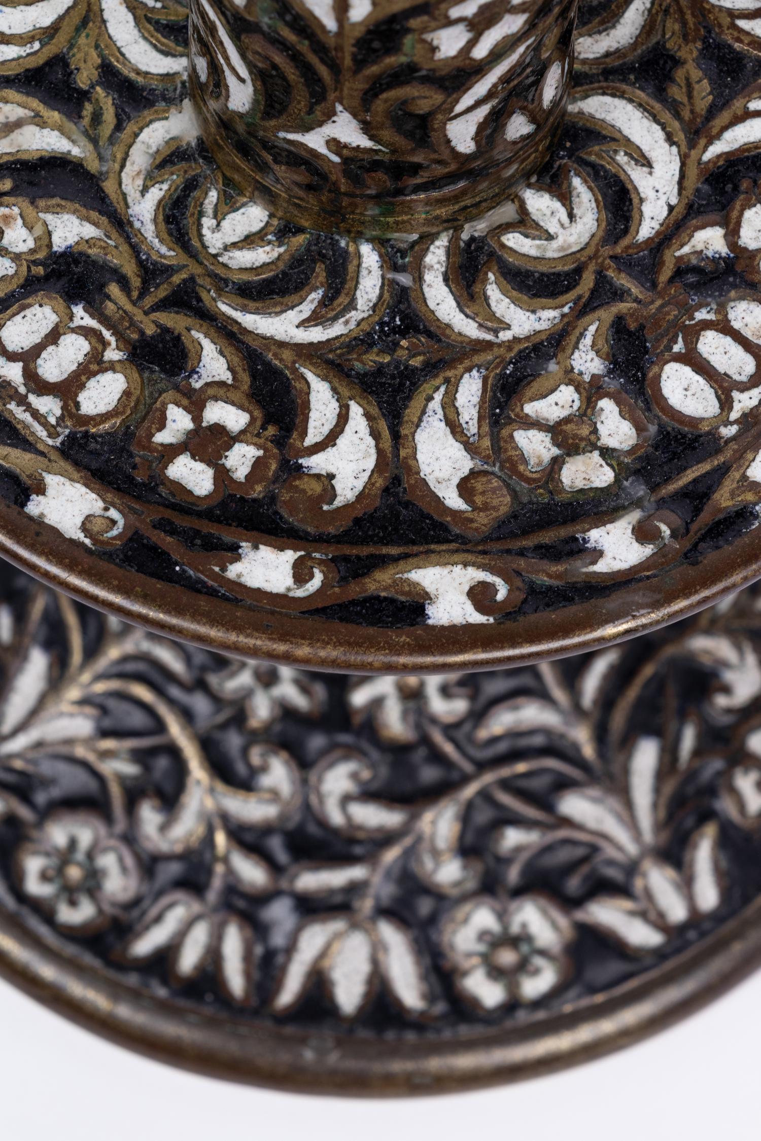 A Pair of Cast Brass 'Surrey Enamel' Candlesticks