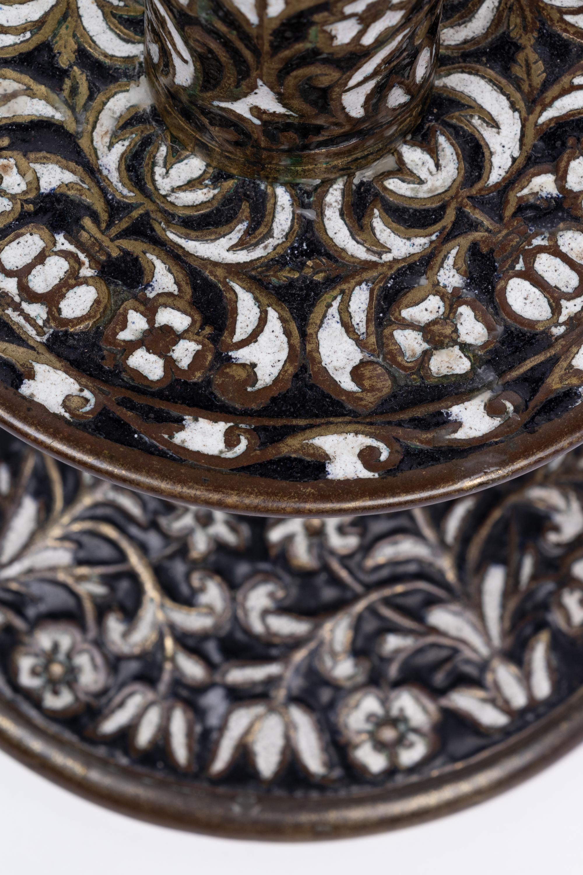 A Pair of Cast Brass 'Surrey Enamel' Candlesticks