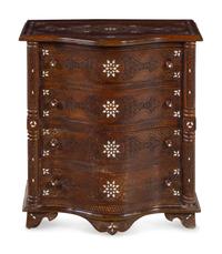 A Near Pair of Syrian Carved and Mother-of-Pearl Inlaid Walnut Serpentine Chest of Drawers