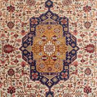 A Signed Silk Rug