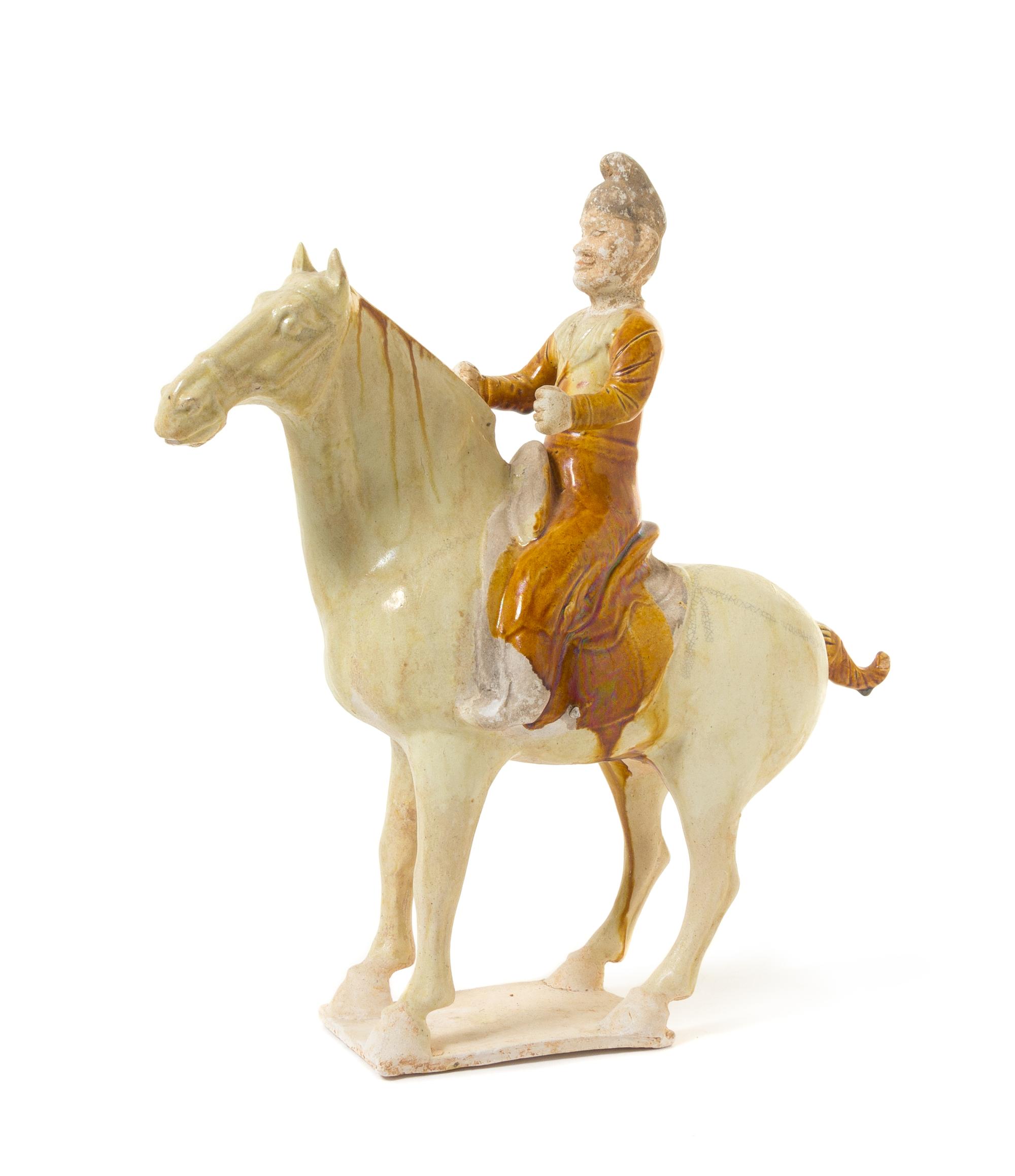 A Glazed Pottery Equestrian Figure — POSSIBLY TANG DYNASTY