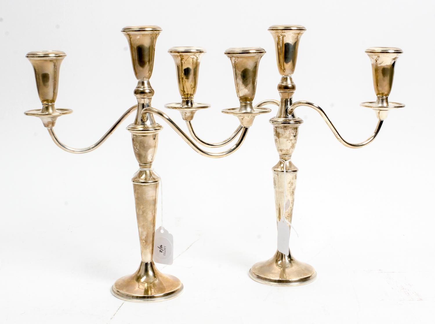 A Pair of American Silver Three-Light Candelabra, Retailed by Neiman Marcus, 20th Century, the baluster form stem issuing the central c