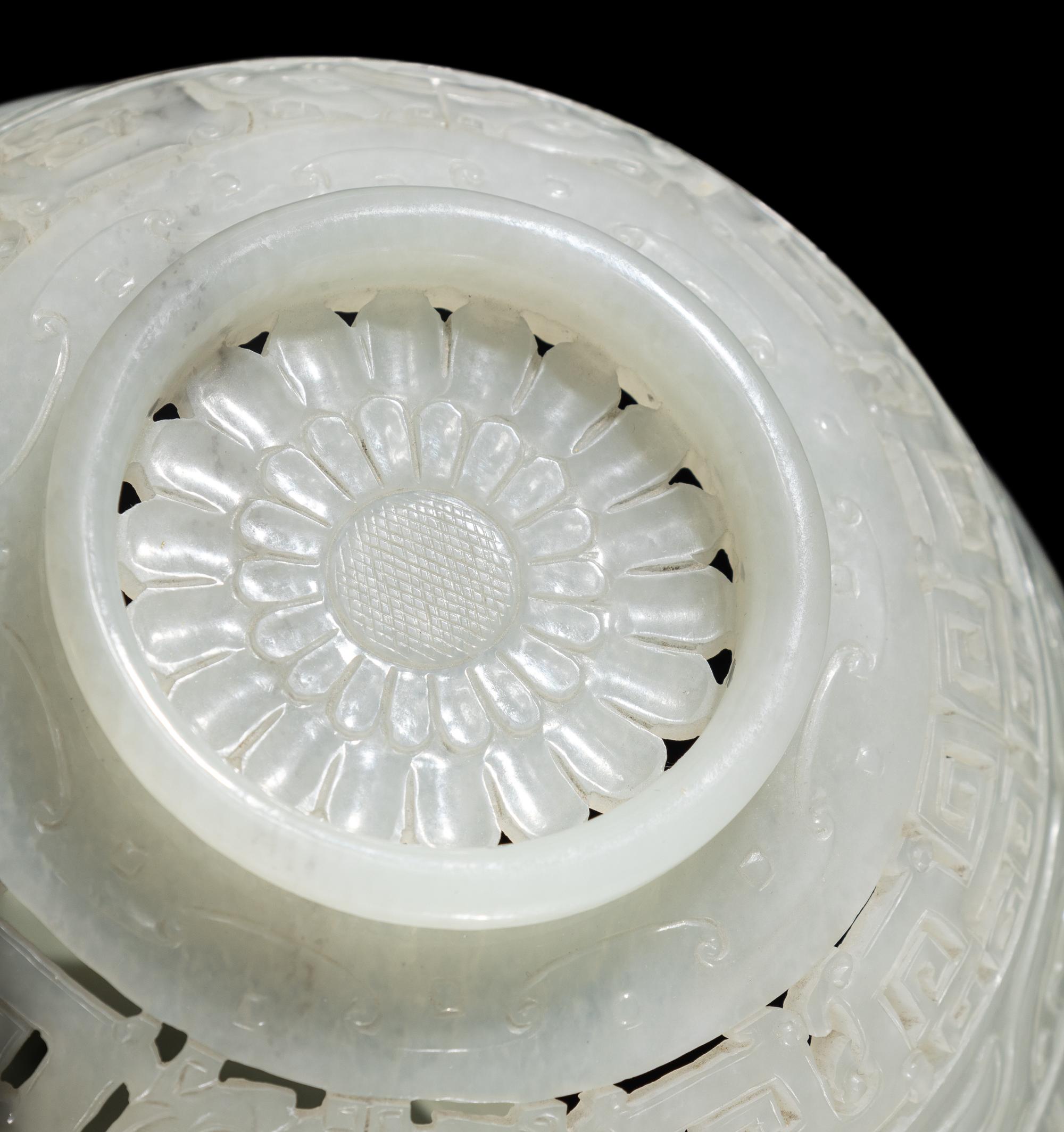 A Chinese Carved and Pierced 'Archaistic' White Jade Bowl and Cover
