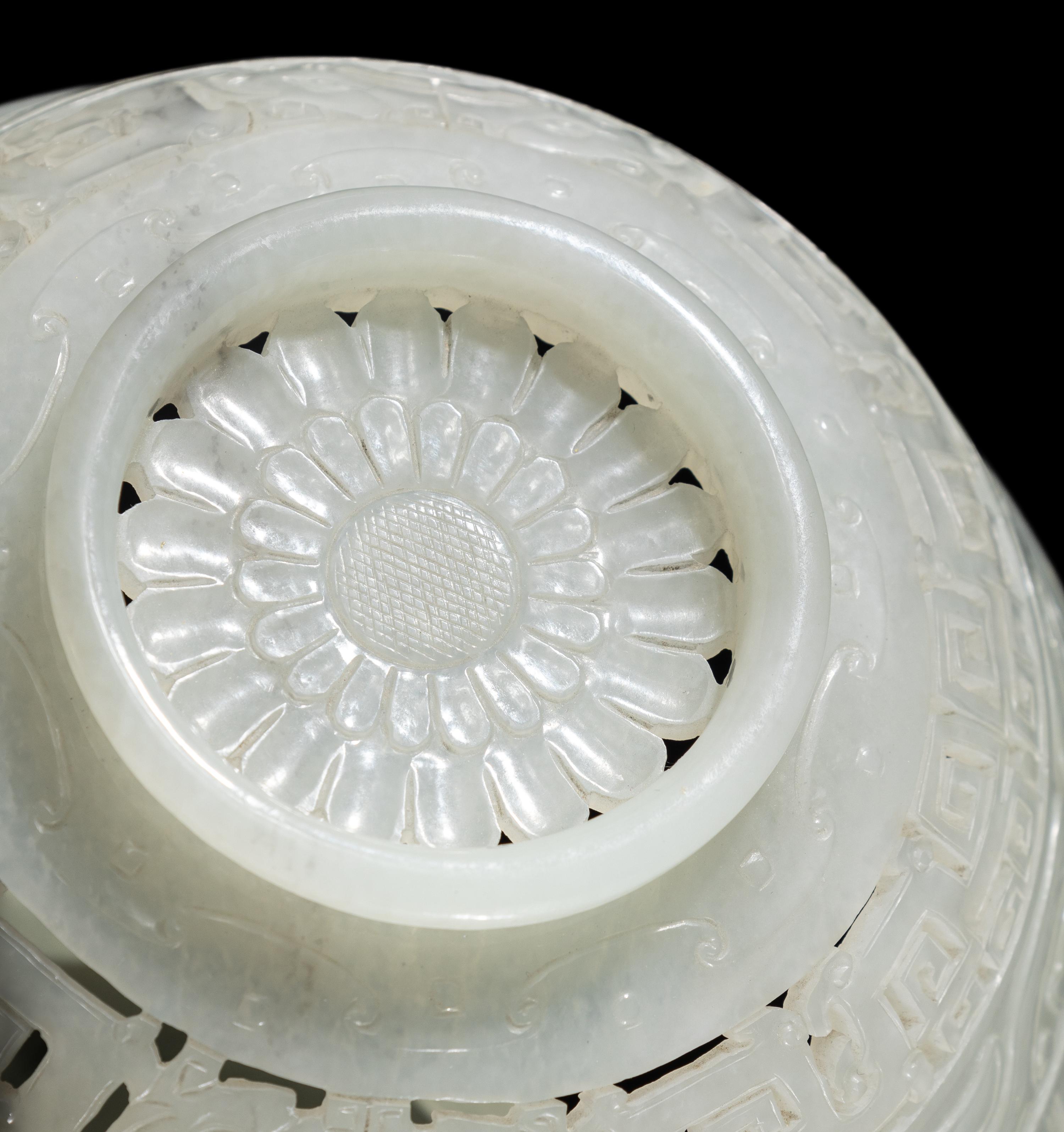 A Chinese Carved and Pierced 'Archaistic' White Jade Bowl and Cover