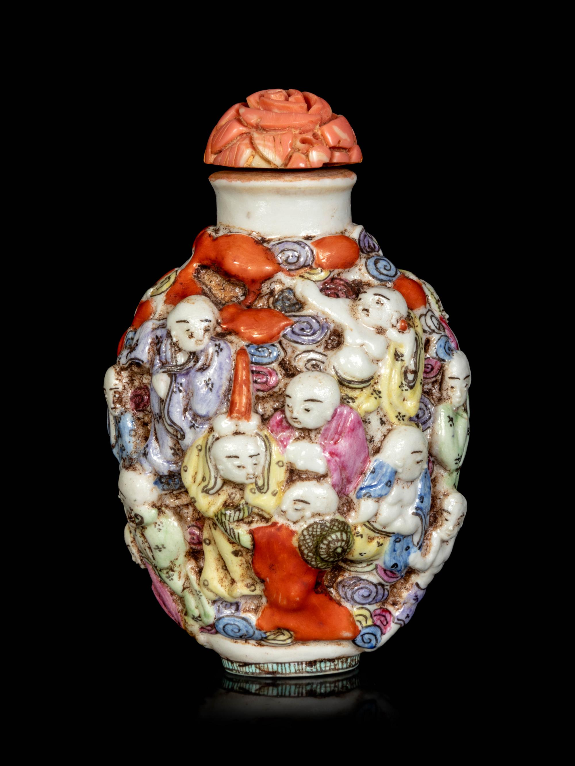 A Chinese Molded Famille Rose Porcelain ‘Luohan’ Snuff Bottle