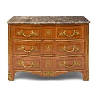 A Régence Style Gilt Bronze Mounted Marble Top Commode