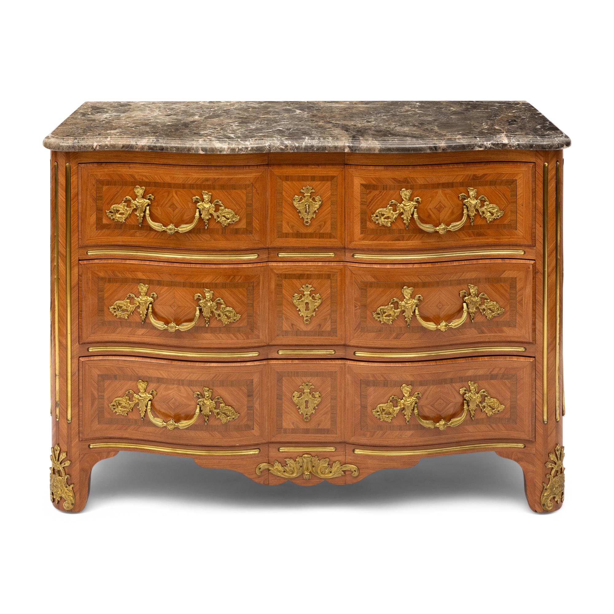 A Régence Style Gilt Bronze Mounted Marble Top Commode