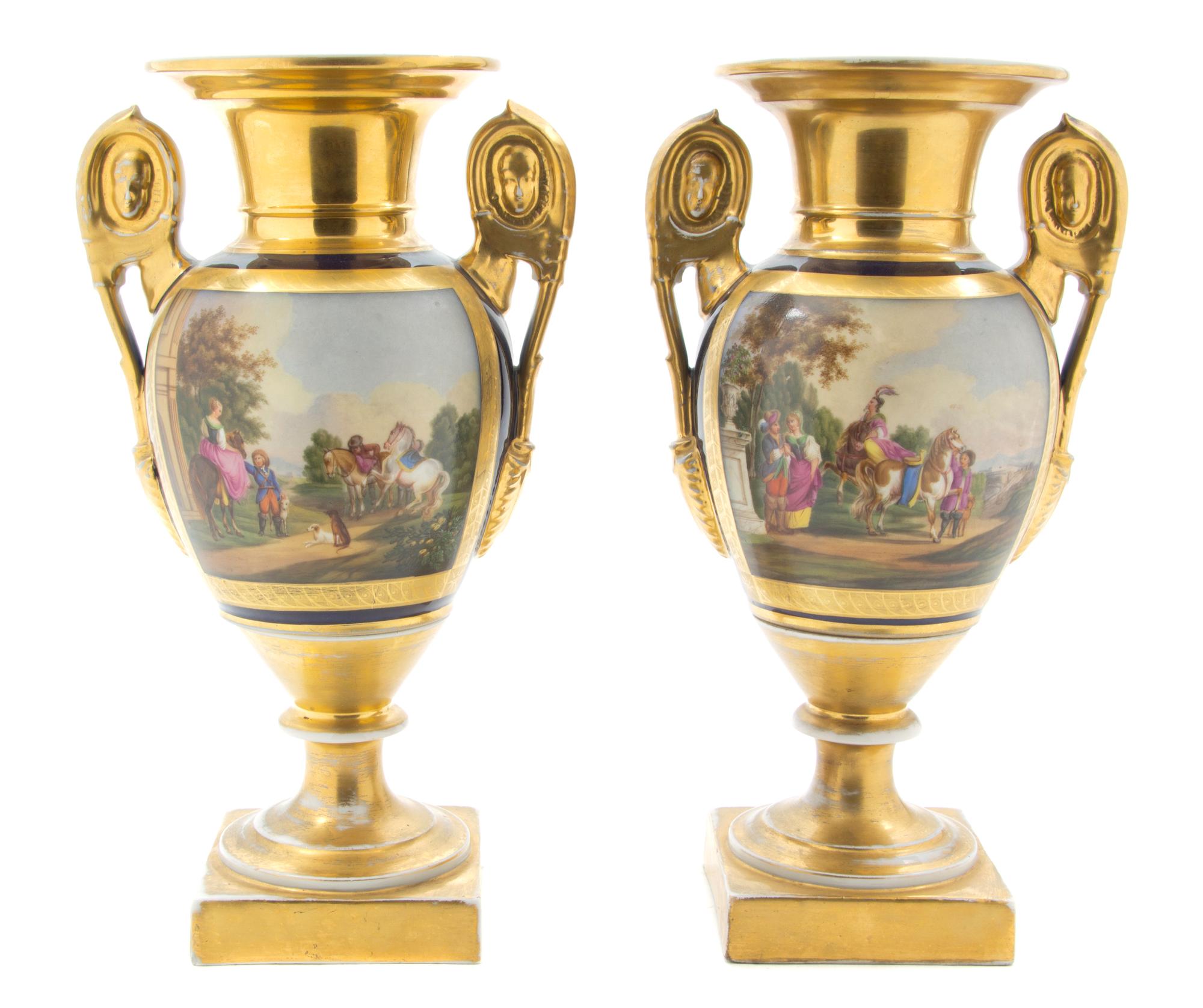 A Pair of Paris Porcelain Urns, Height 12 1/2 inches.