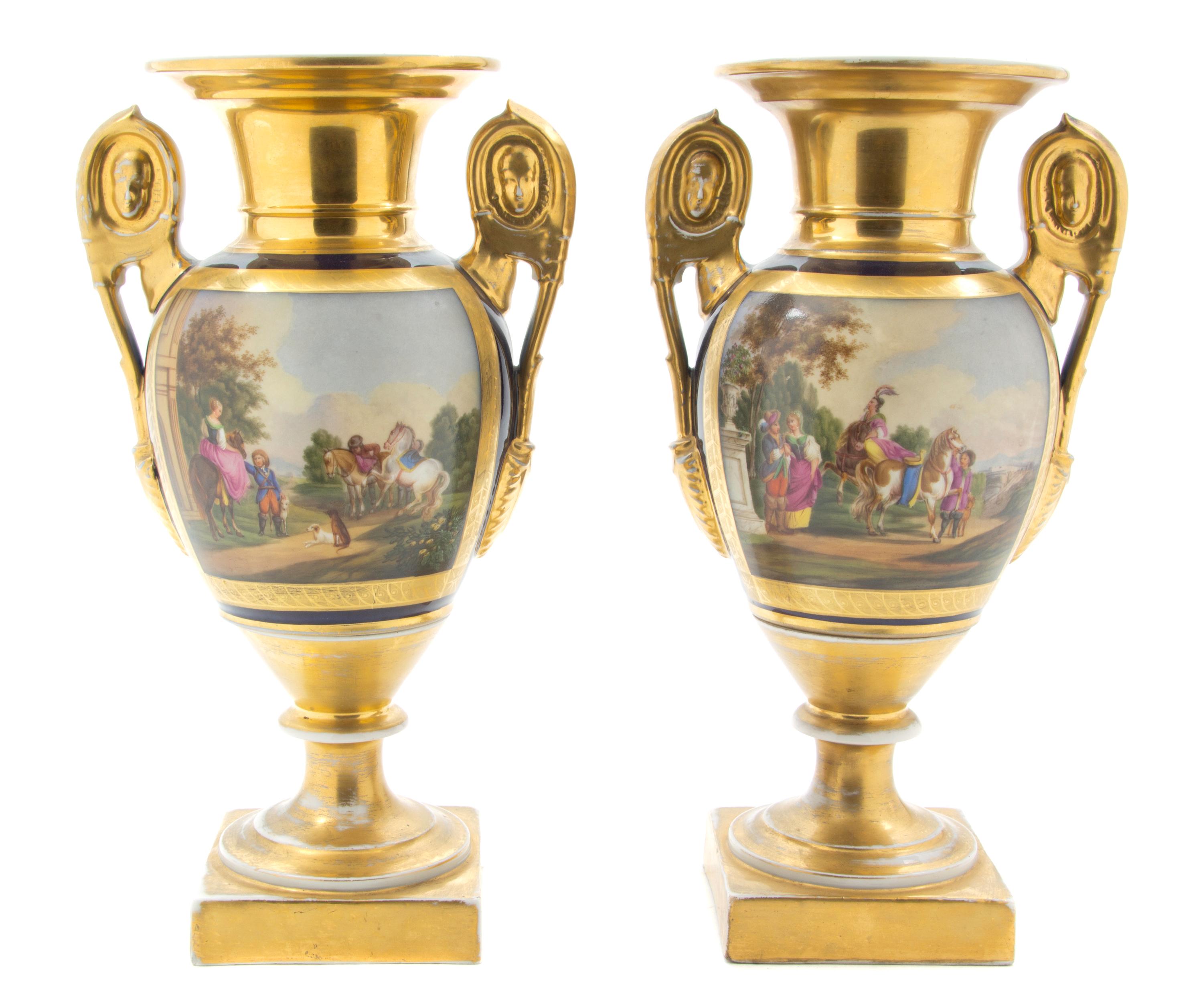 A Pair of Paris Porcelain Urns, Height 12 1/2 inches.