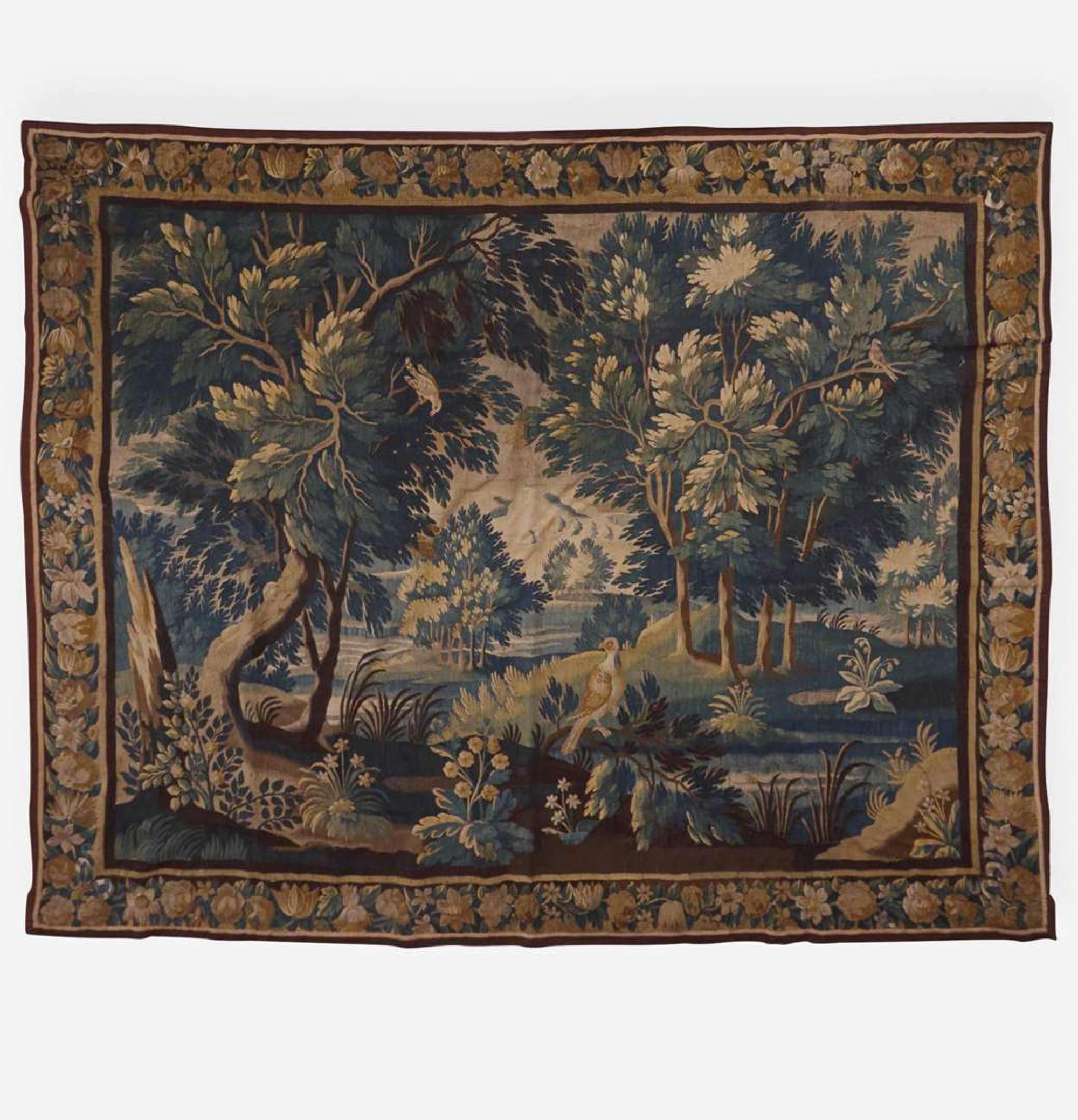 A large Flemish verdure tapestry Probably 18th century