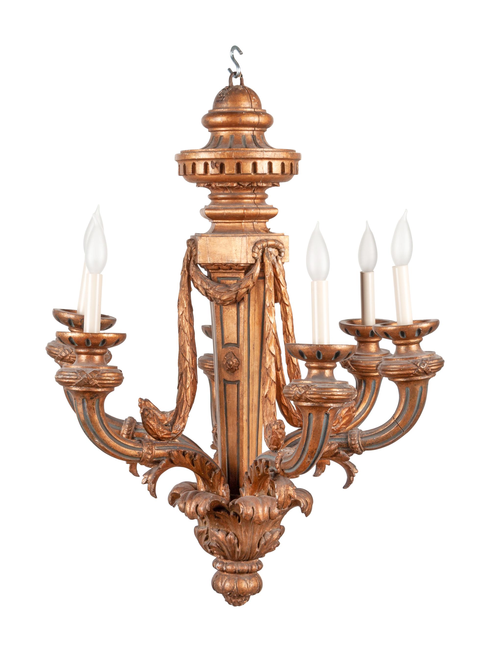 An Italian Baroque Style Giltwood Six-Light Chandelier