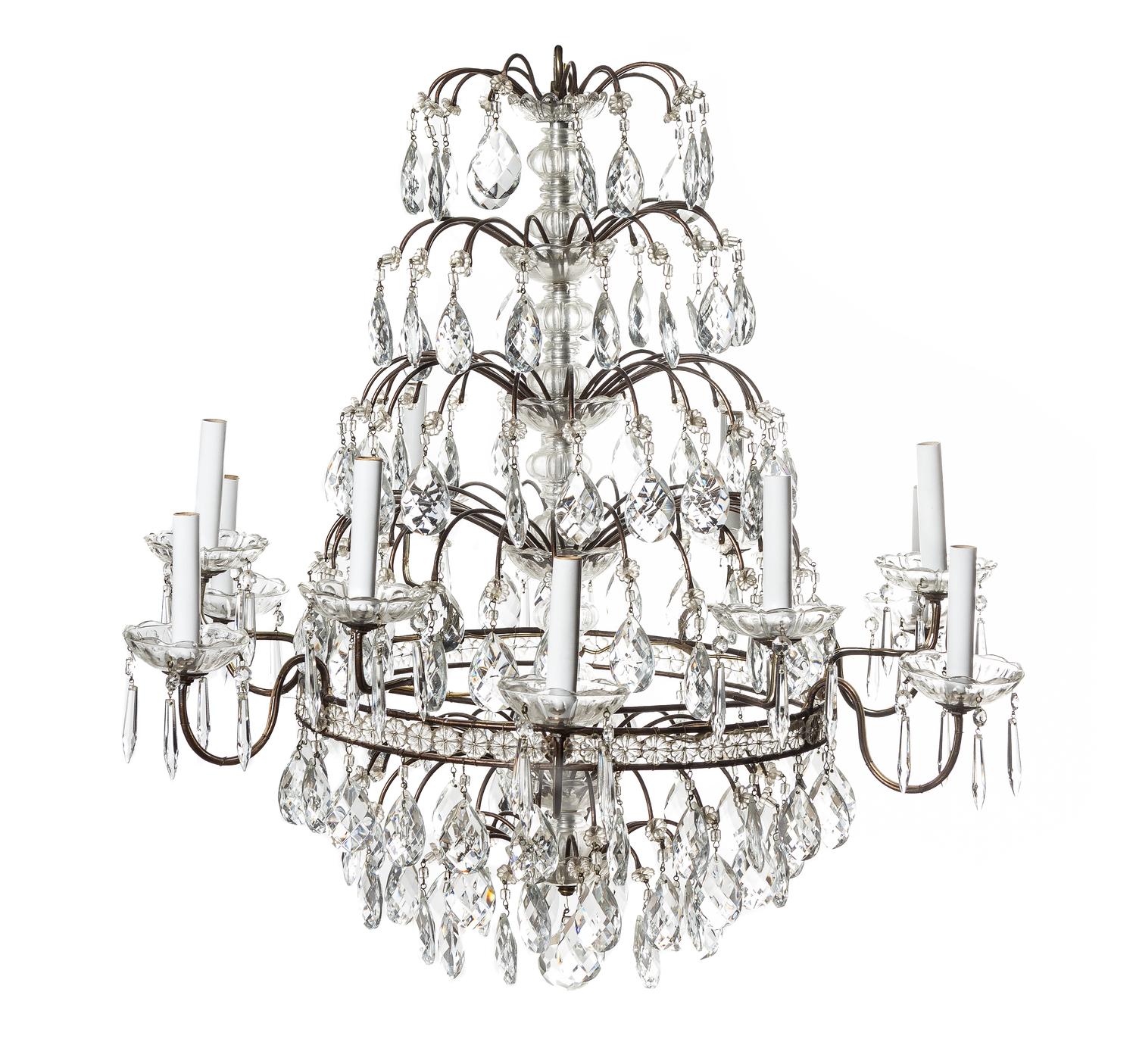 A French Cut Glass Twelve-Light Chandelier, Height 29 1/2 x diameter 31 inches.