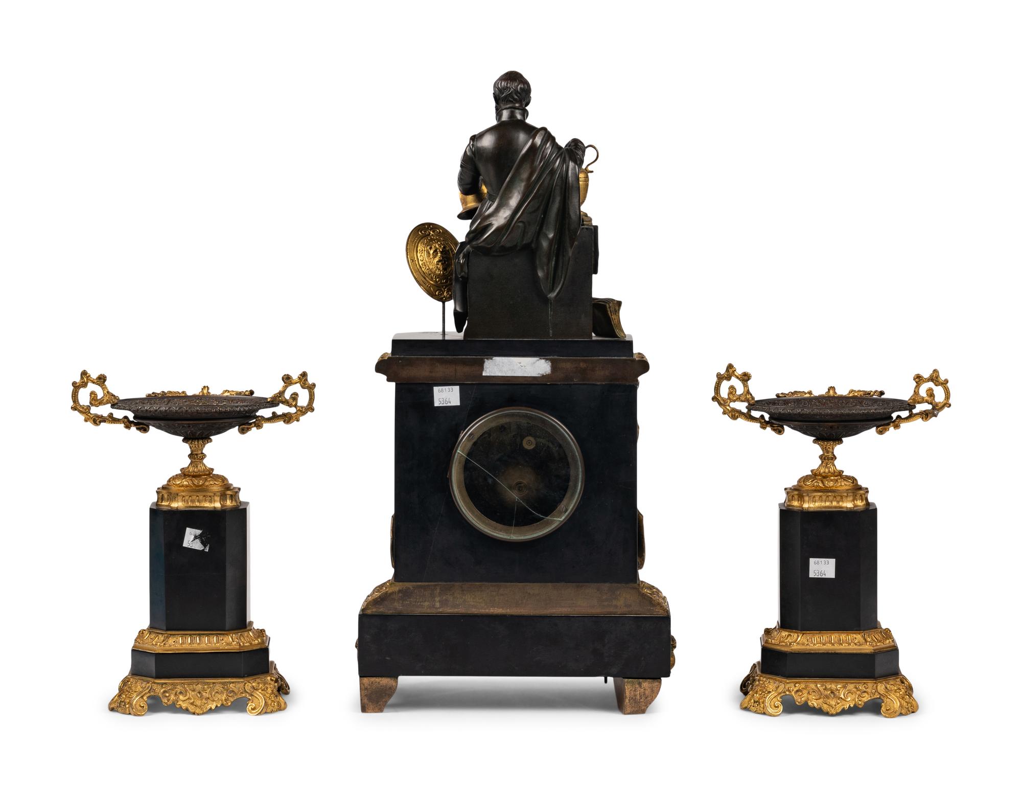 A Napoleon III Gilt Bronze and Slate Clock Garniture