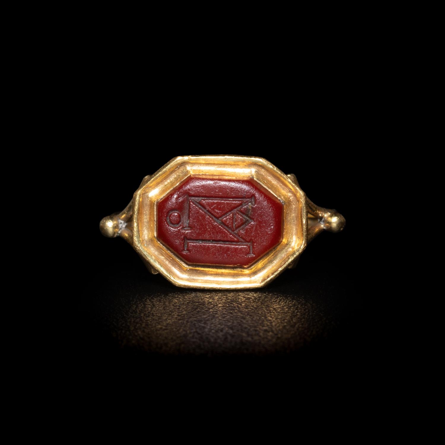 A Late Roman or Byzantine Red Jasper Intaglio with a Monogram — Set in a 19th Century gold ring