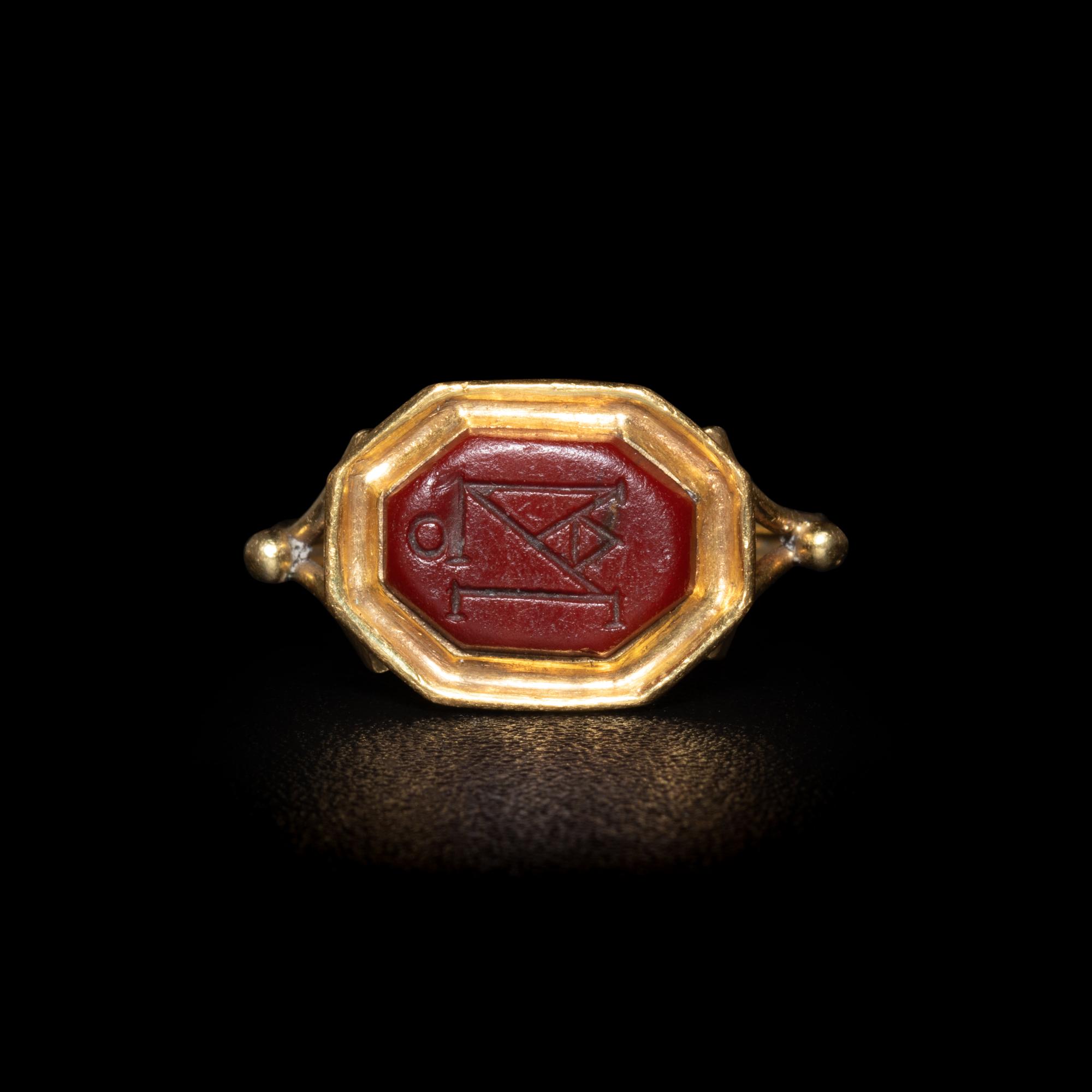 A Late Roman or Byzantine Red Jasper Intaglio with a Monogram — Set in a 19th Century gold ring