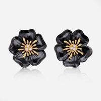 A Pair of Black Acrylic and Diamond Earrings