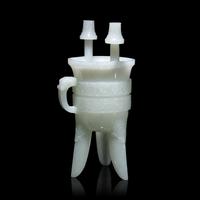 A Chinese Carved Pale Celadon Jade Tripod Vessel, Jia, Late Qing - Early Republic Period 晚清/民國 青白玉仿古斝