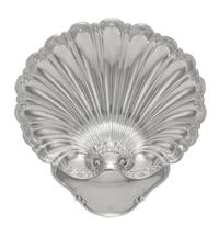 An American Silver Shell Form Dish, Tuttle Silversmiths, Boston, MA, 20th Century, raised on three ball feet.