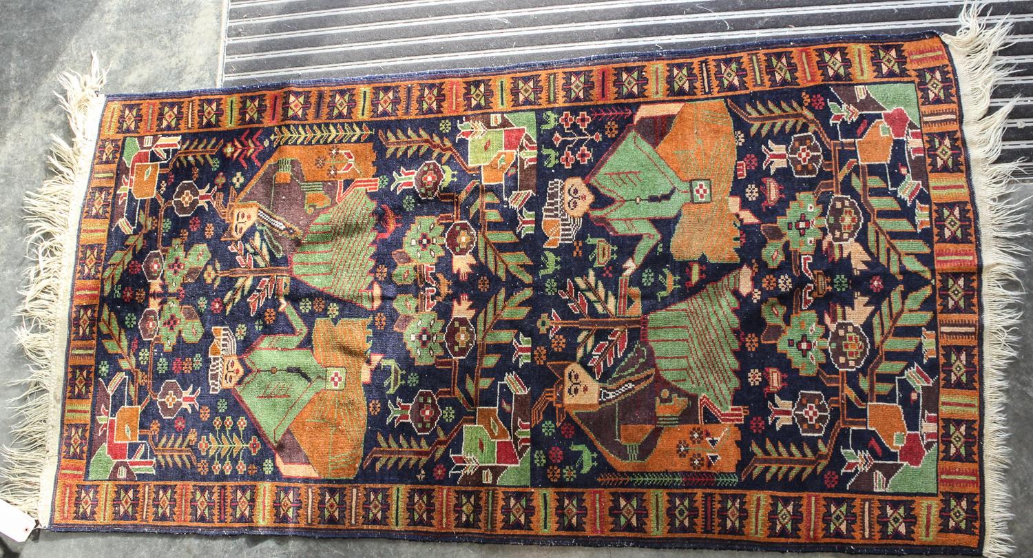 A Northwest Persian Pictorial Wool Rug 6 feet 10 inches x 3 feet 9 inches. — MID 20TH CENTURY