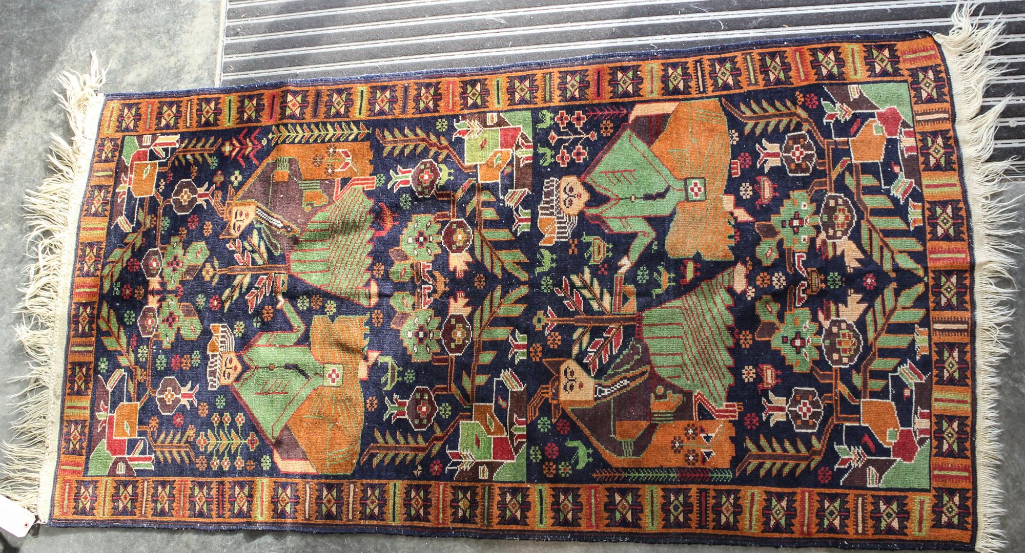A Northwest Persian Pictorial Wool Rug 6 feet 10 inches x 3 feet 9 inches. — MID 20TH CENTURY