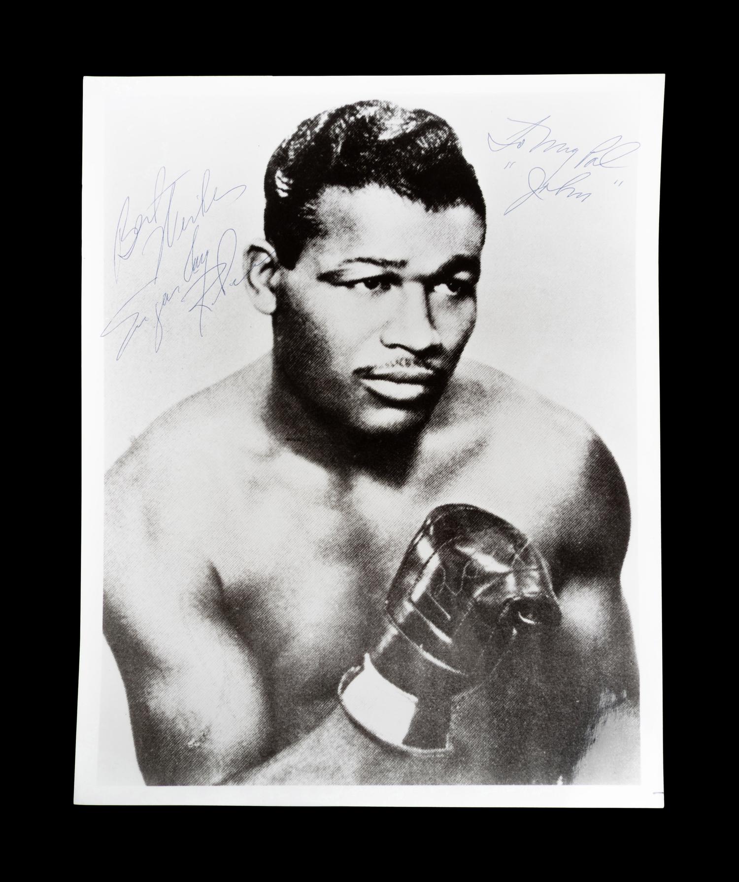 A Boxing Champion Sugar Ray Robinson Signed Photograph,