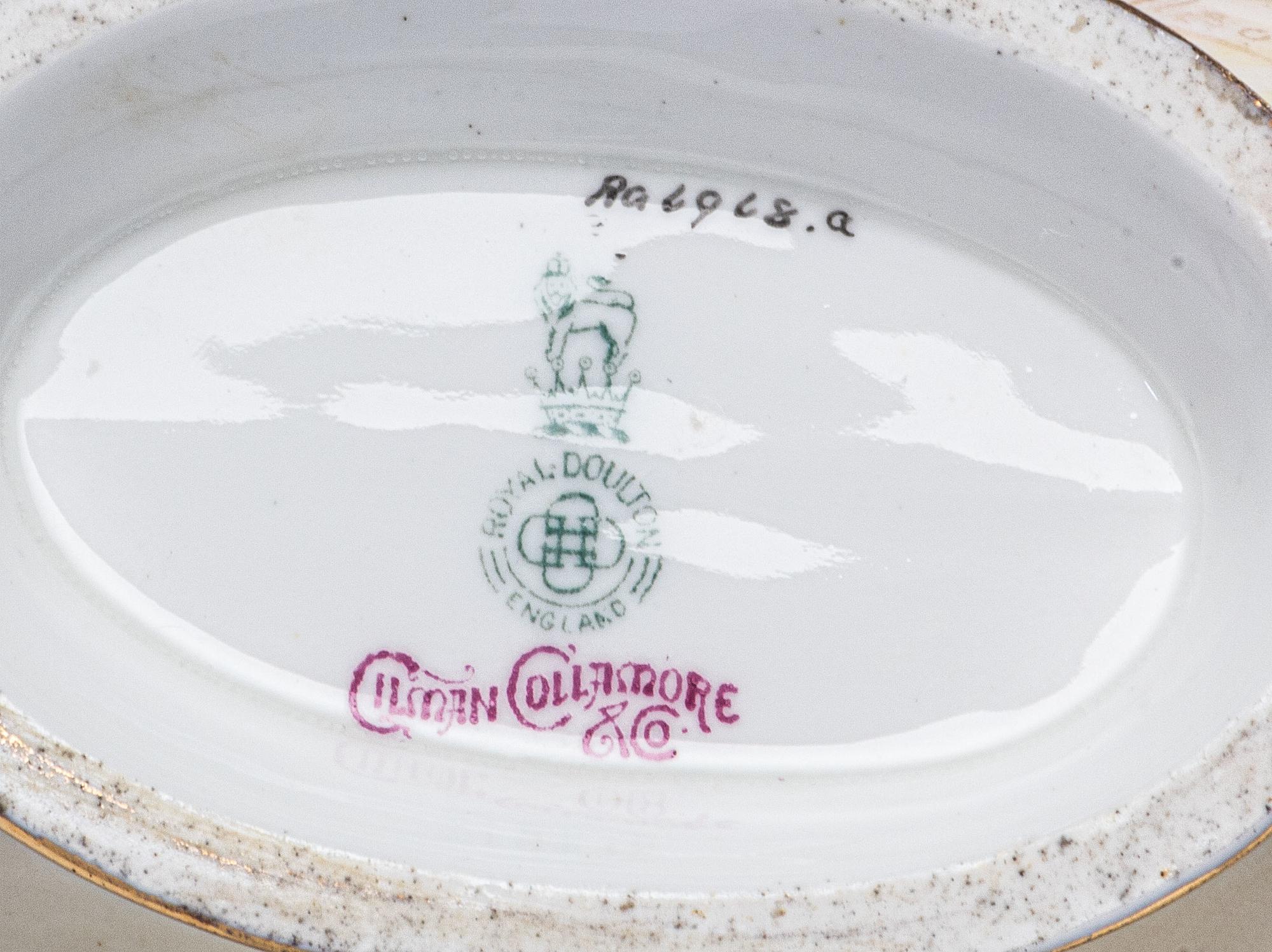 A Royal Doulton Parcel Gilt Porcelain Fish Service
