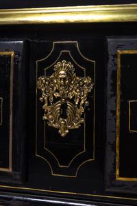 A Régence Gilt Bronze Mounted Ebony Commode