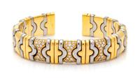 DINO CEVA, YELLOW GOLD, STEEL AND DIAMOND CUFF BRACELET