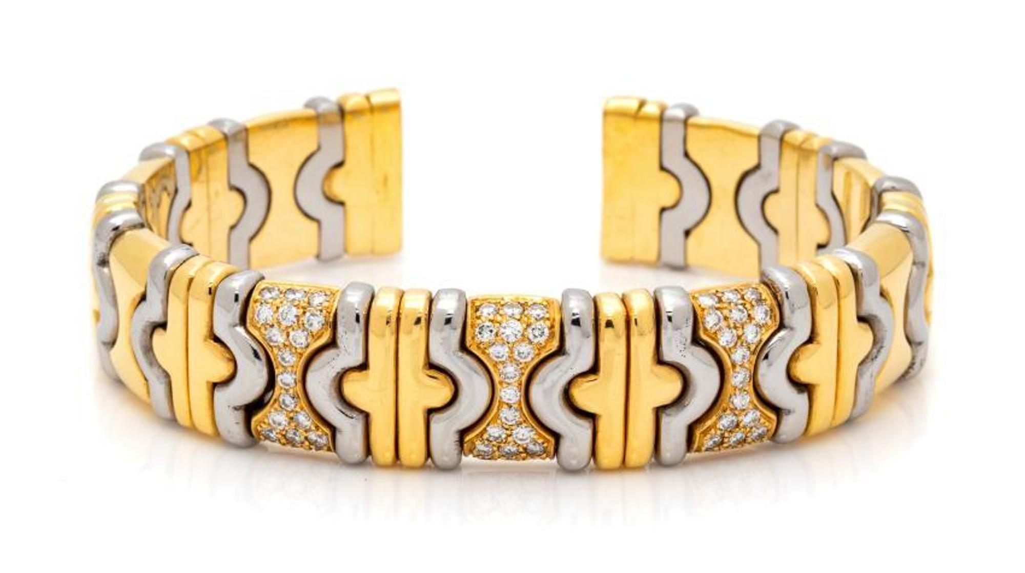 DINO CEVA, YELLOW GOLD, STEEL AND DIAMOND CUFF BRACELET