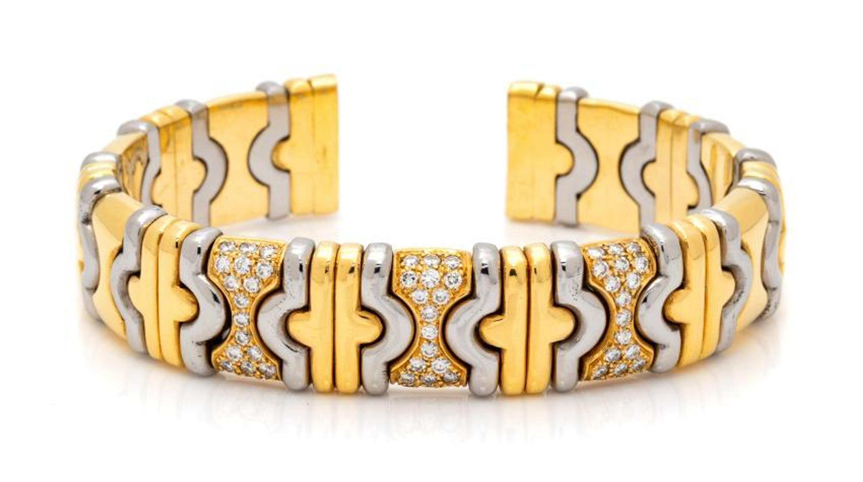 DINO CEVA, YELLOW GOLD, STEEL AND DIAMOND CUFF BRACELET