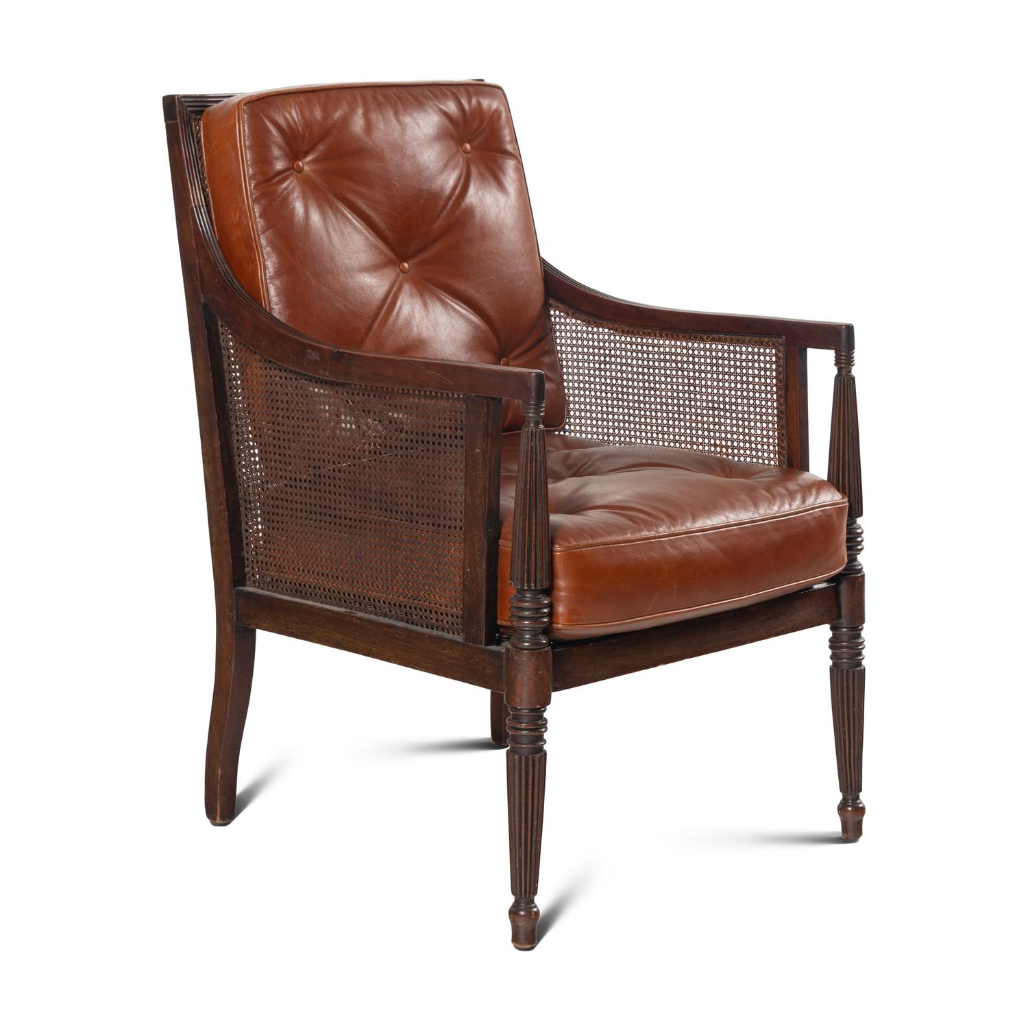 An English Mahogany and Caned Library Bergère