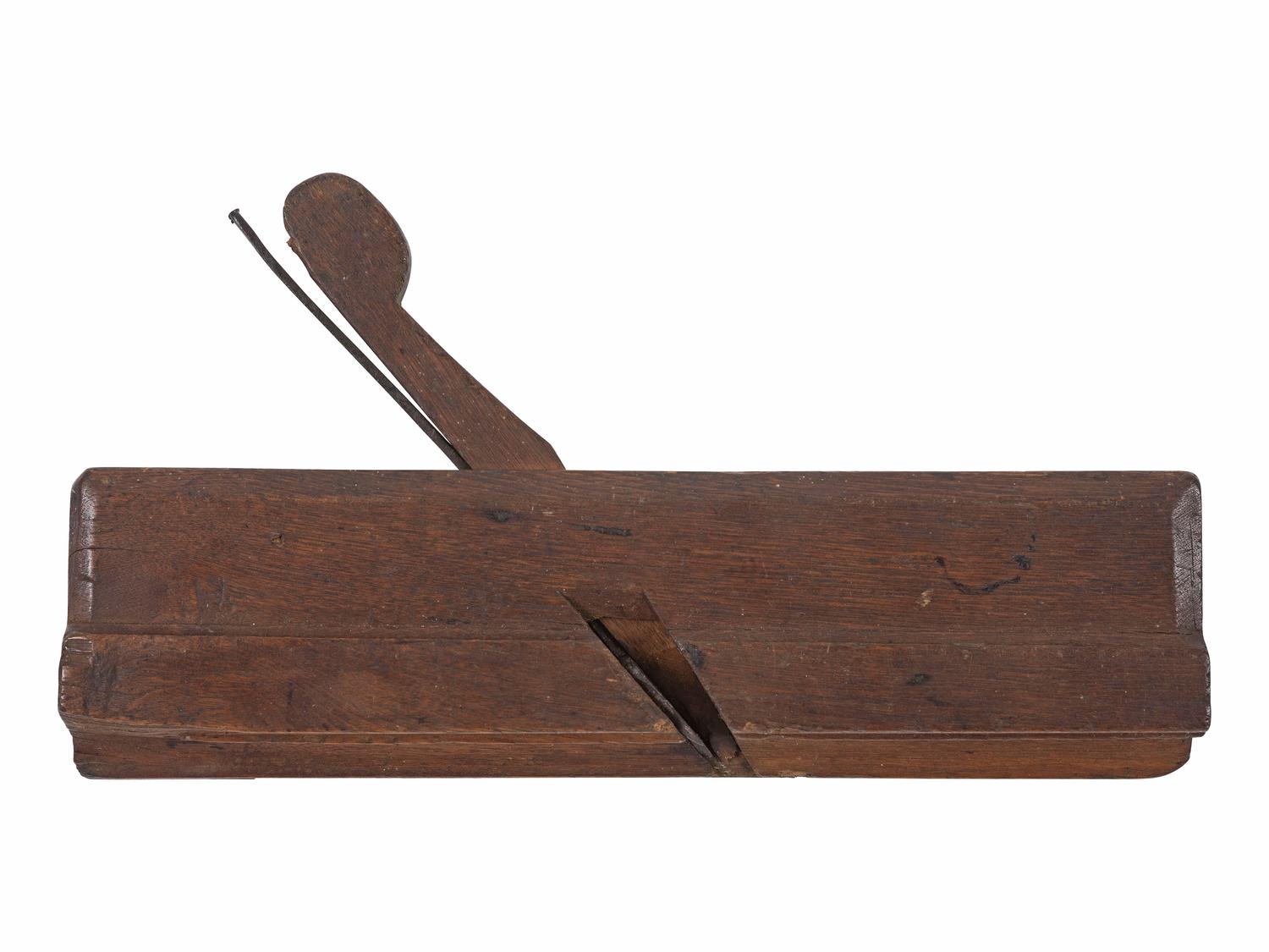 [AFRICAN AMERICANA]. Wood molding plane made by Cesar Chelor (ca 1720-1784), the earliest documented African American planemaker in North America. Wrentham, Massachusetts. Ca 1750s-1780s.