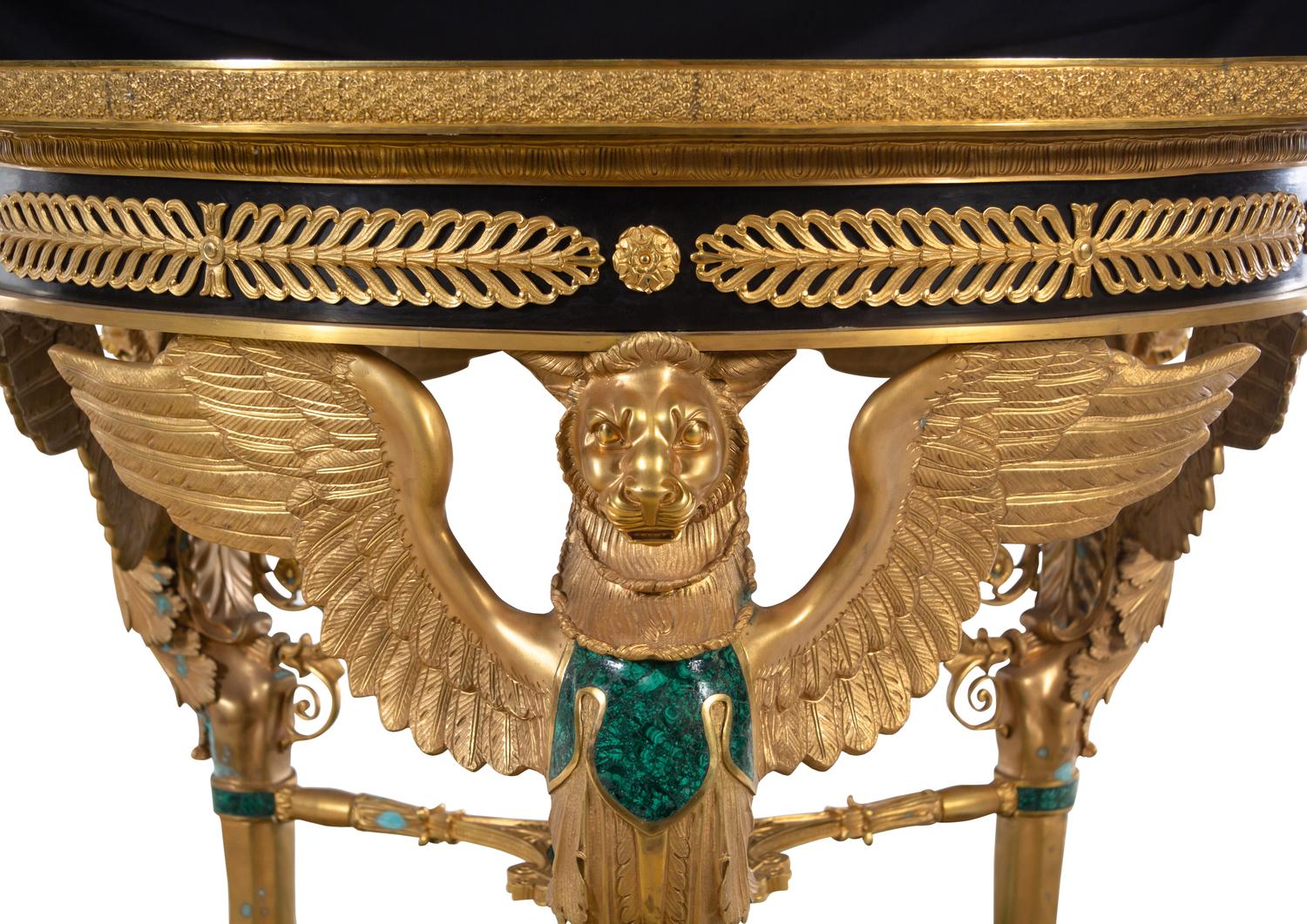 An Empire Style Gilt Bronze and Malachite Veneered Guéridon