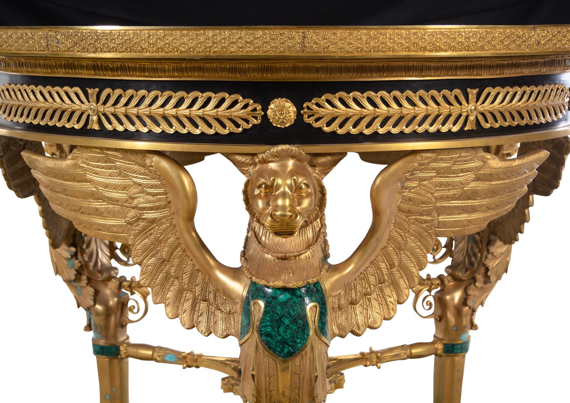 An Empire Style Gilt Bronze and Malachite Veneered Guéridon