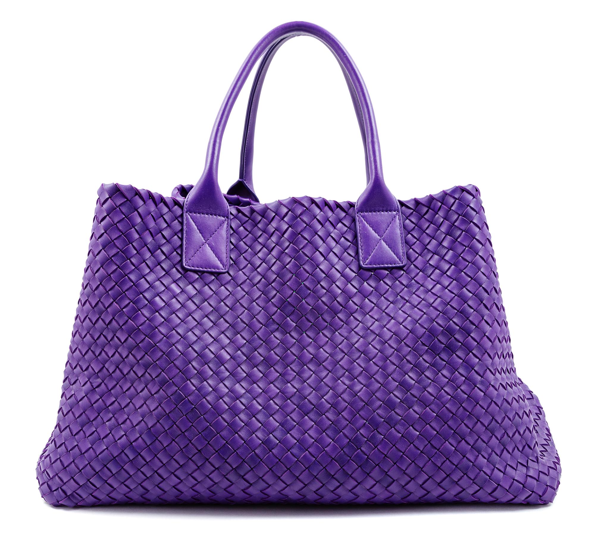 A Bottega Veneta Purple Intrecciato Leather Tote, 11.25" H x 19.5" W x 9" D; Handle drop: 7"; Pouch: 6.25" x 10.5".