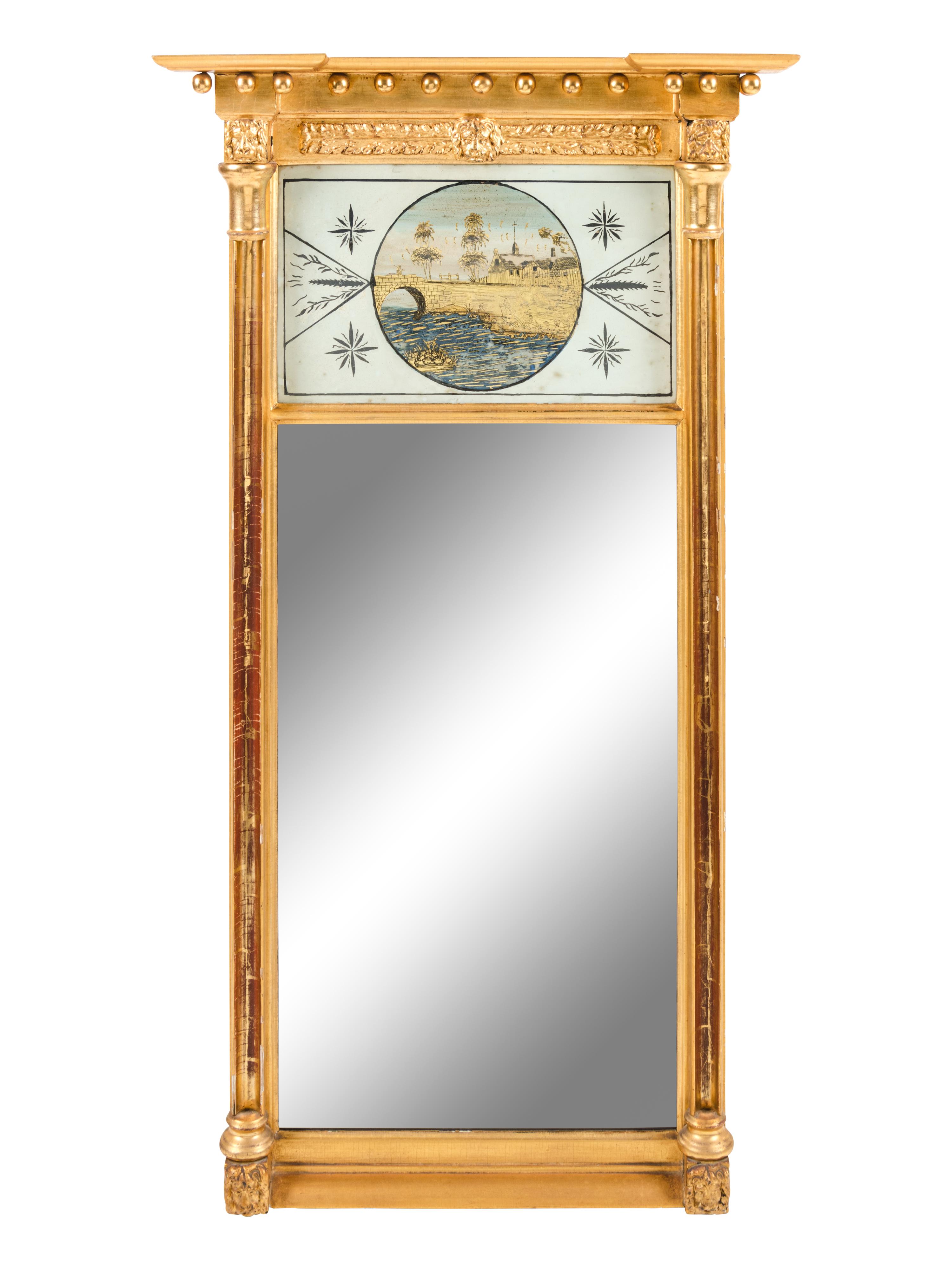 A Federal Giltwood and Églomisé Looking Glass